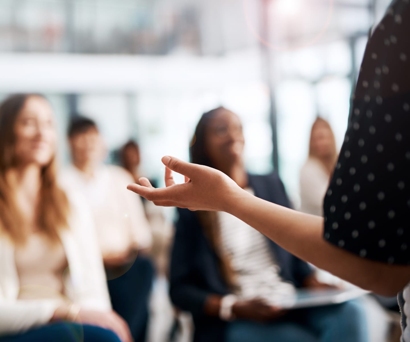 Person presenting to audience