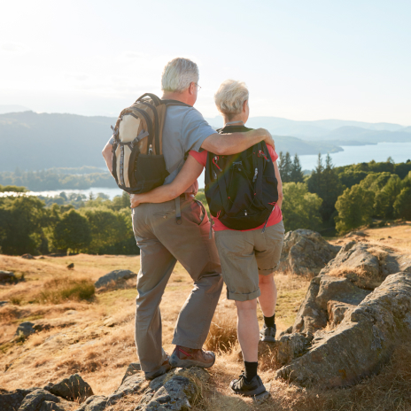 Man and woman hiking in woods